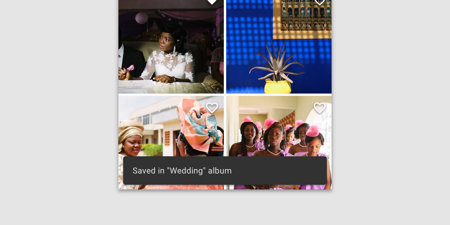 Single line text label on mobile Snackbar. Text label is Saved in “Wedding” album