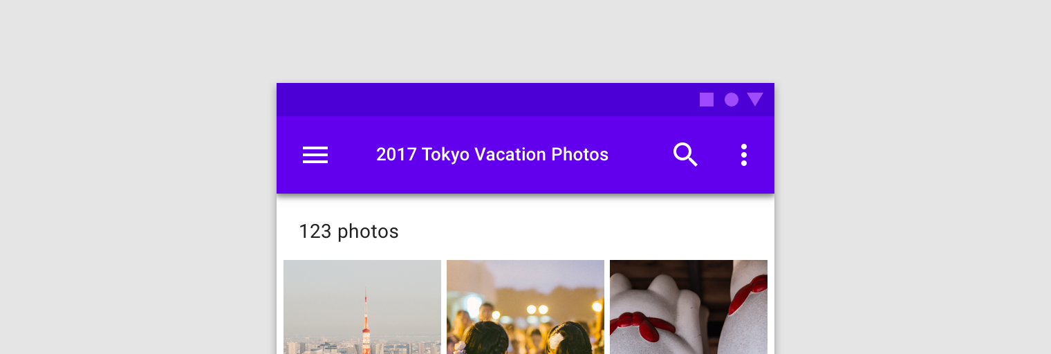 Top app bar with shrunk text size of title “2017 Tokyo Vacation photos”.