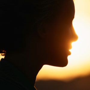 Woman silhouette with bright light