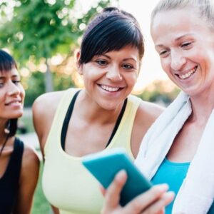 Women looking at smartphone