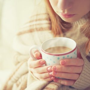 Girl with warm tea