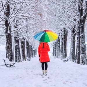 Girl with a colorful umbrella