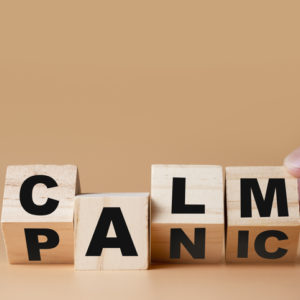 Blocks spelling calm and panic