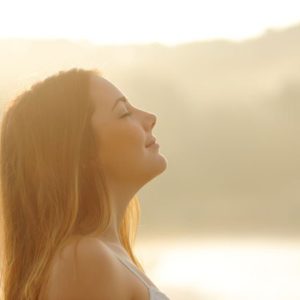 Woman breathing in nature