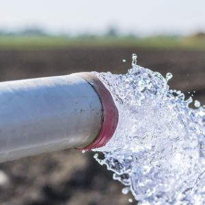 Water spills into a field