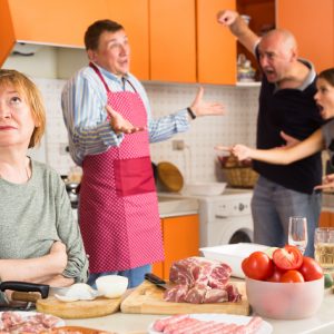 Upset mother with her family fighting and not getting along