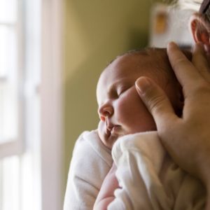 Woman holding infant