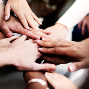 diverse hands in circle