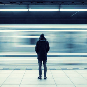 Man alone at subway station