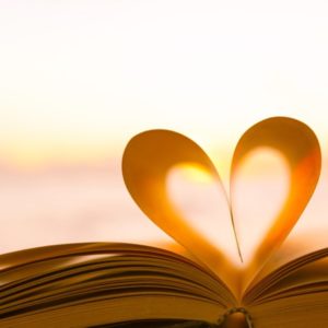 Book heart with sunset