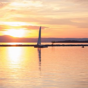 Sailboat on still lake