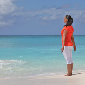 Woman breathing by the sea