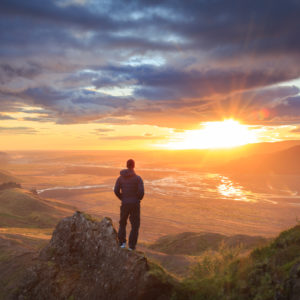 Man and sunrise