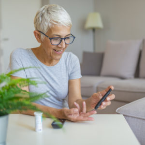 Woman checking blood sugar