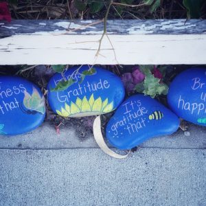 Gratitude affirmations for health painted on rocks