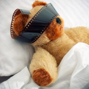 teddy bear with camera film over eyes for lucid dreaming how to lucid dream