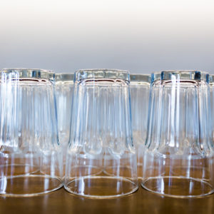 empty glasses on a shelf