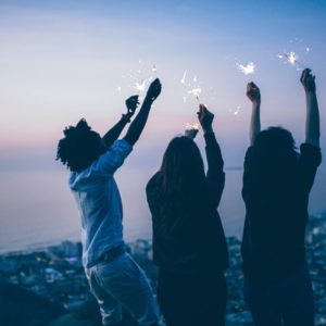 Young people celebrating in the evening