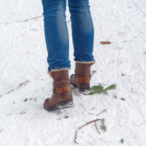 Woman walking on snow