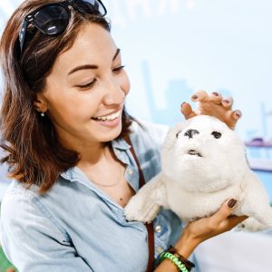 Robopets woman with toy animal plushy