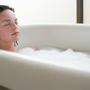 Woman relaxing in bath