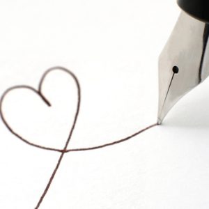 Pen drawing a heart