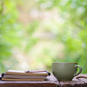 notebooks and cup