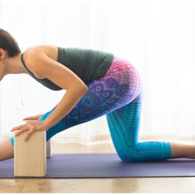 Half-hanumanasana yoga pose with blocks