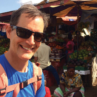 Paul Sutherland in Ugandan market