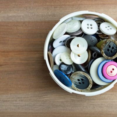 Assortment of buttons on wood