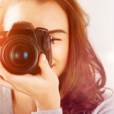 Closeup of woman taking photo