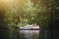 Woman resting in jungle