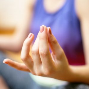 Woman's hands while meditating