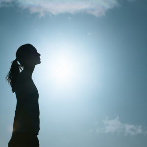 Woman looking toward sky