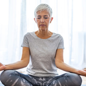 A woman meditates