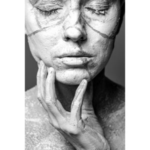 woman's face with clay