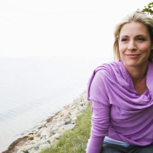 Content woman on beach