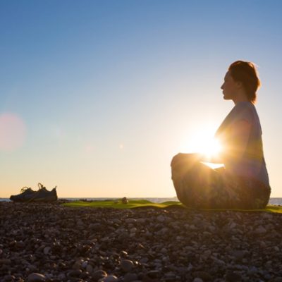 Woman silhouette in meditation