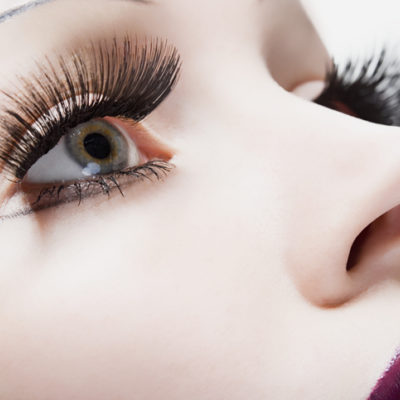 A woman with large fake eyelashes