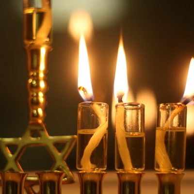 On the third night of Chanukah, three small oil cups are have been lit.