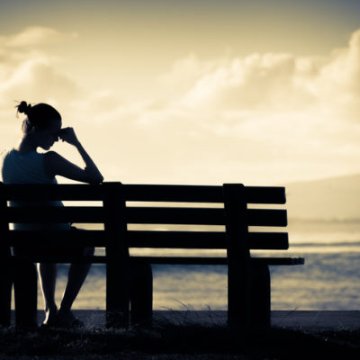 Lonely Woman on Bench