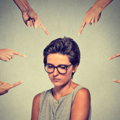 Woman getting pointed at