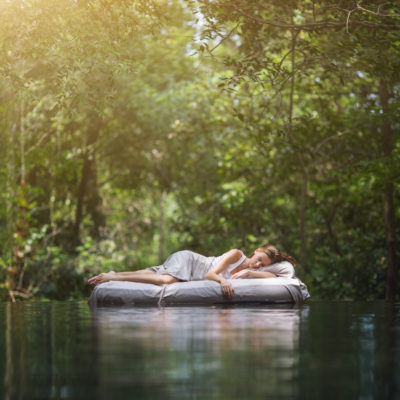 Woman resting in jungle