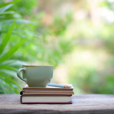 cup and books
