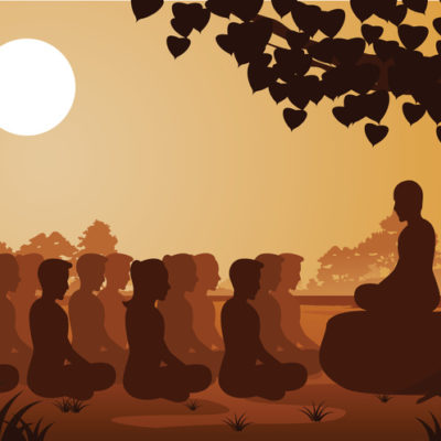 group learning to meditate under a tree