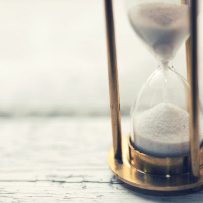 Hourglass on table