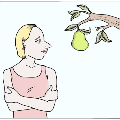 A women glances at a pear tree