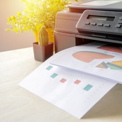 printer printing out pages with graphs on them