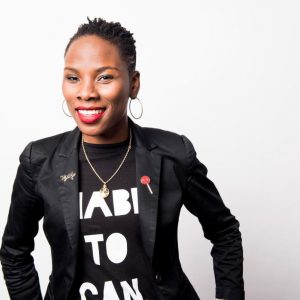 Luvvie Ajayi Jones, an award-winning author, speaker, and podcast host.