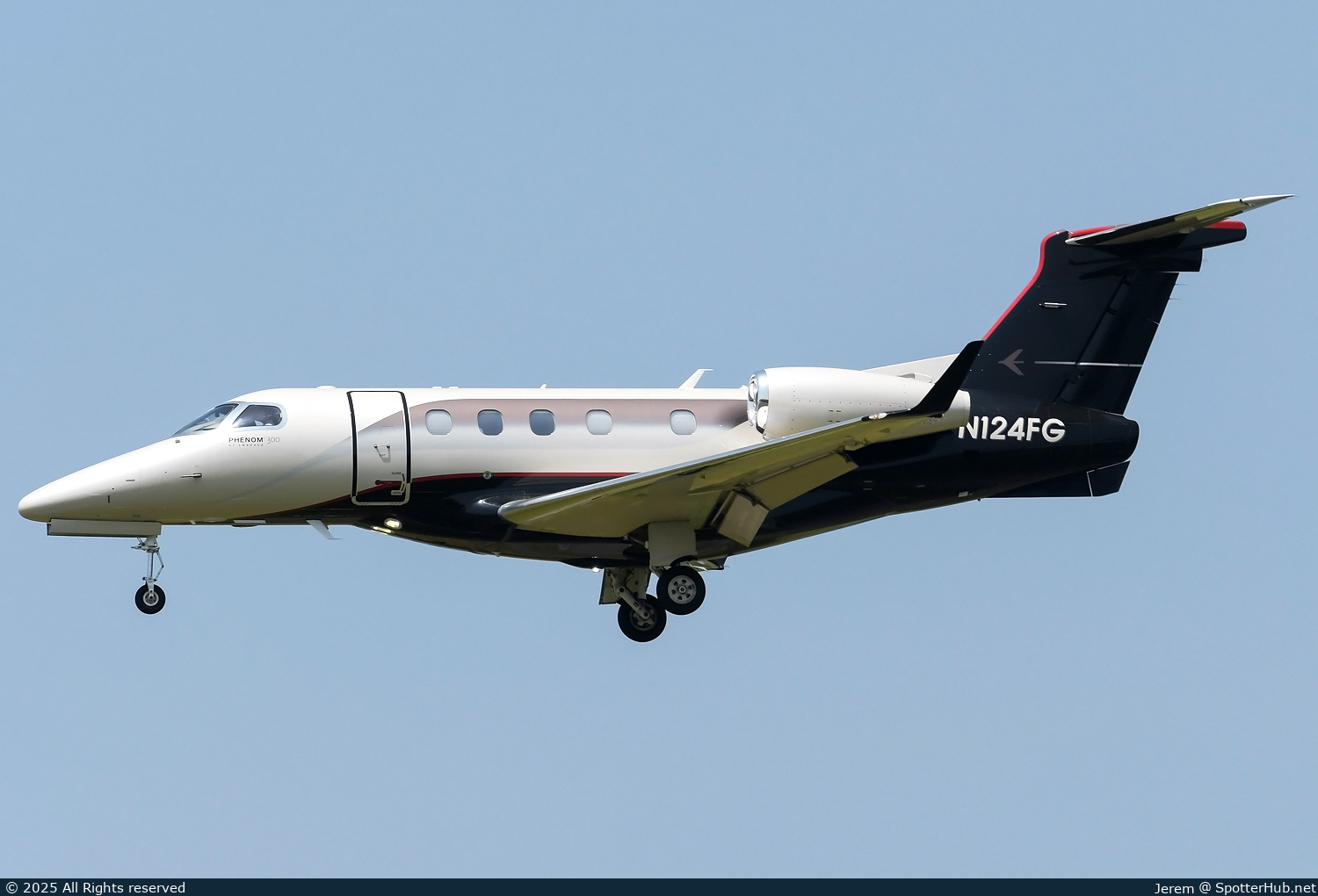 Photo of N124FG - Embraer Phenom 300 operated by Brew Culture